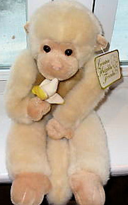 stuffed monkey holding a banana