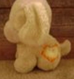 80's? Commonwealth Toy Yellow & White Musical Dog with PRESS in an Orange Heart on the Tush