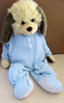 Tan Dog with Long Brown Ears wearing a Blue Nightgown