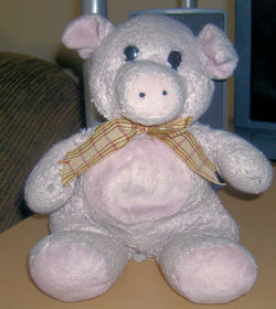 Pastel Pink Pig with a Cream Bow with Brown and Burgundy Stripes