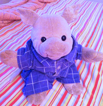 Oinking pink velour stuffed pig