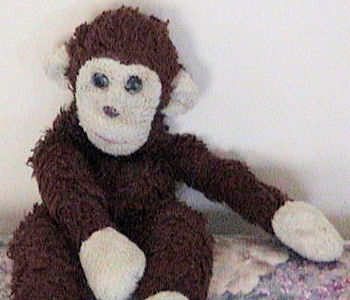 stuffed brown monkey